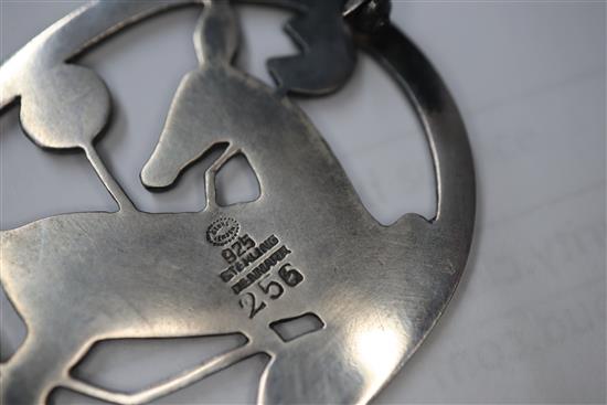 A Danish Georg Jensen sterling kneeling deer oval brooch, no. 256, 43mm.